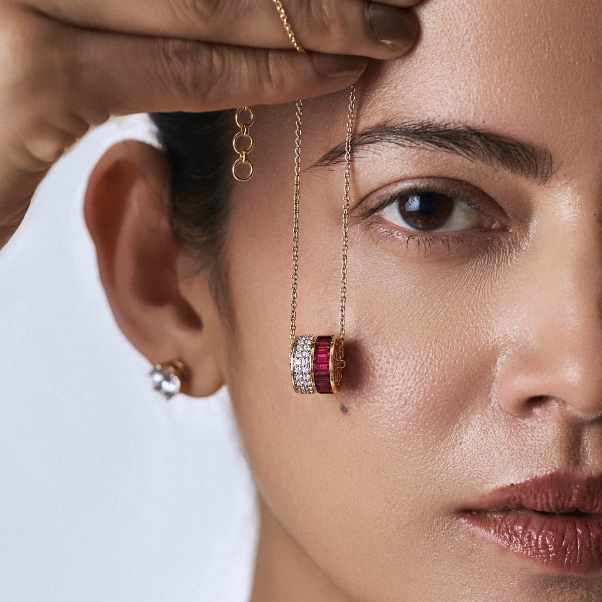 Drum Ruby Lab Grown Diamond Necklace on model face in 9KT